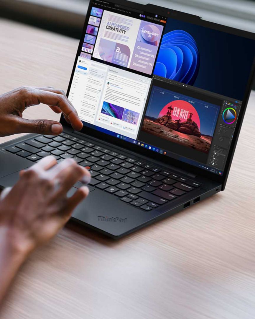 Hands typing on a laptop’s keyboard. 