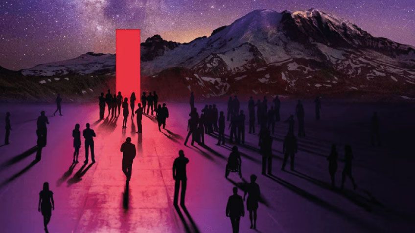 Crowd gathers around a glowing red monolith under a starry sky with mountains in the background.