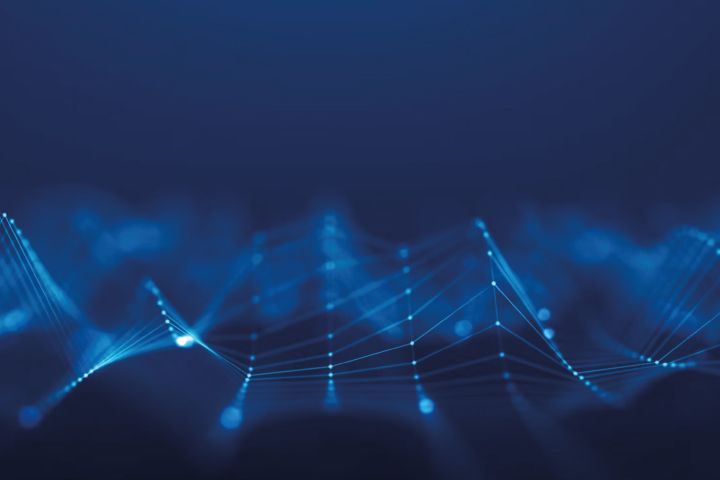 Abstract blue network with glowing nodes and lines on a dark background.