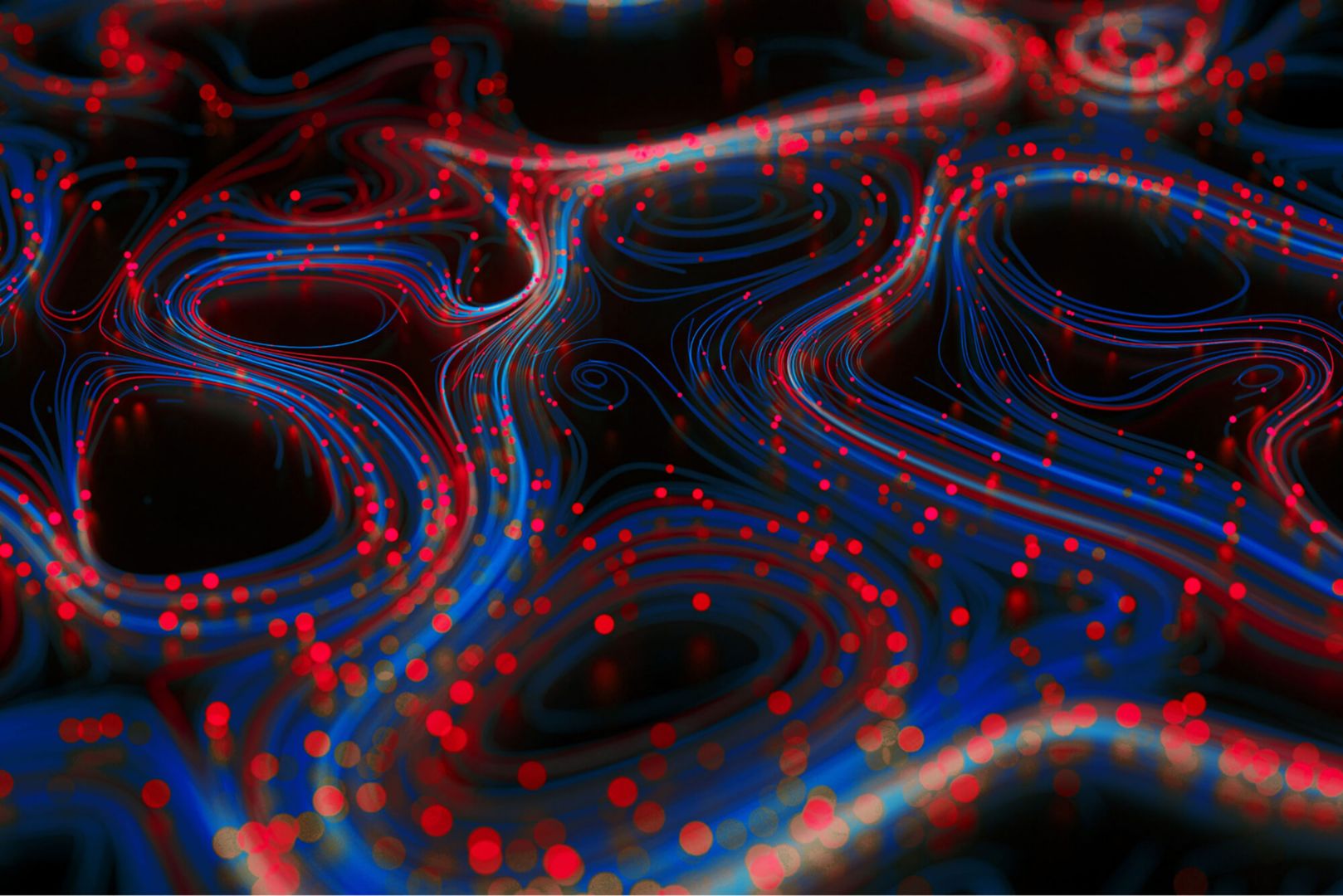 Blue swirls with red dots over a black background.