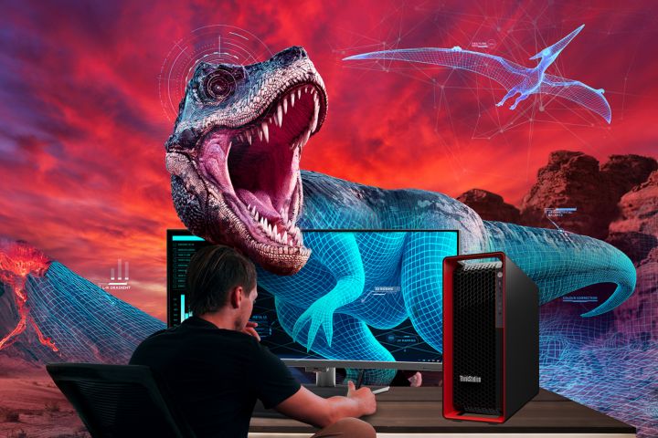 Designer creating a 3D dinosaur model on a monitor beside a Lenovo ThinkStation workstation
