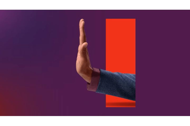 A hand coming out of red geometric cutout in a purple background