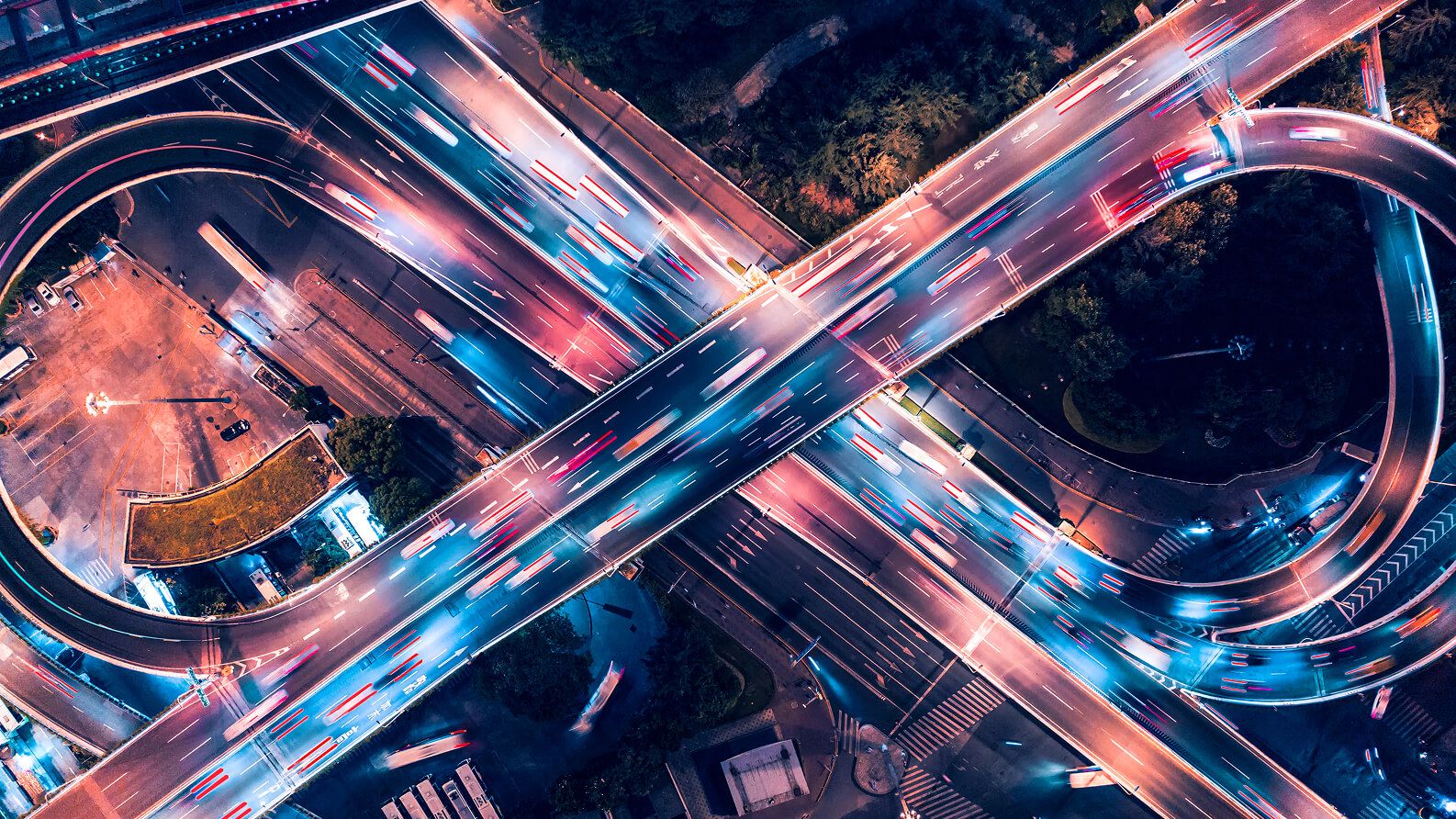 An aerial time lapse of cars changing highways.