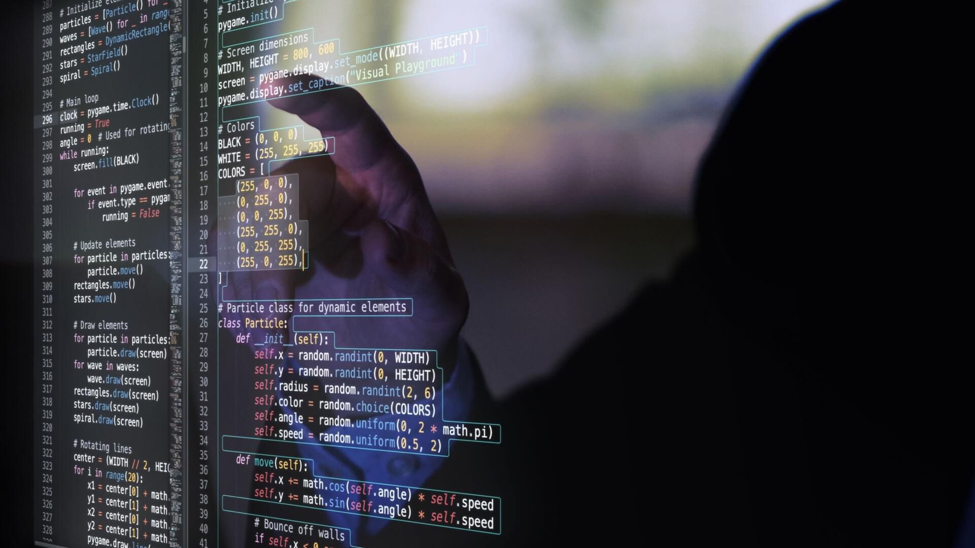 Computer code on a dark screen. 