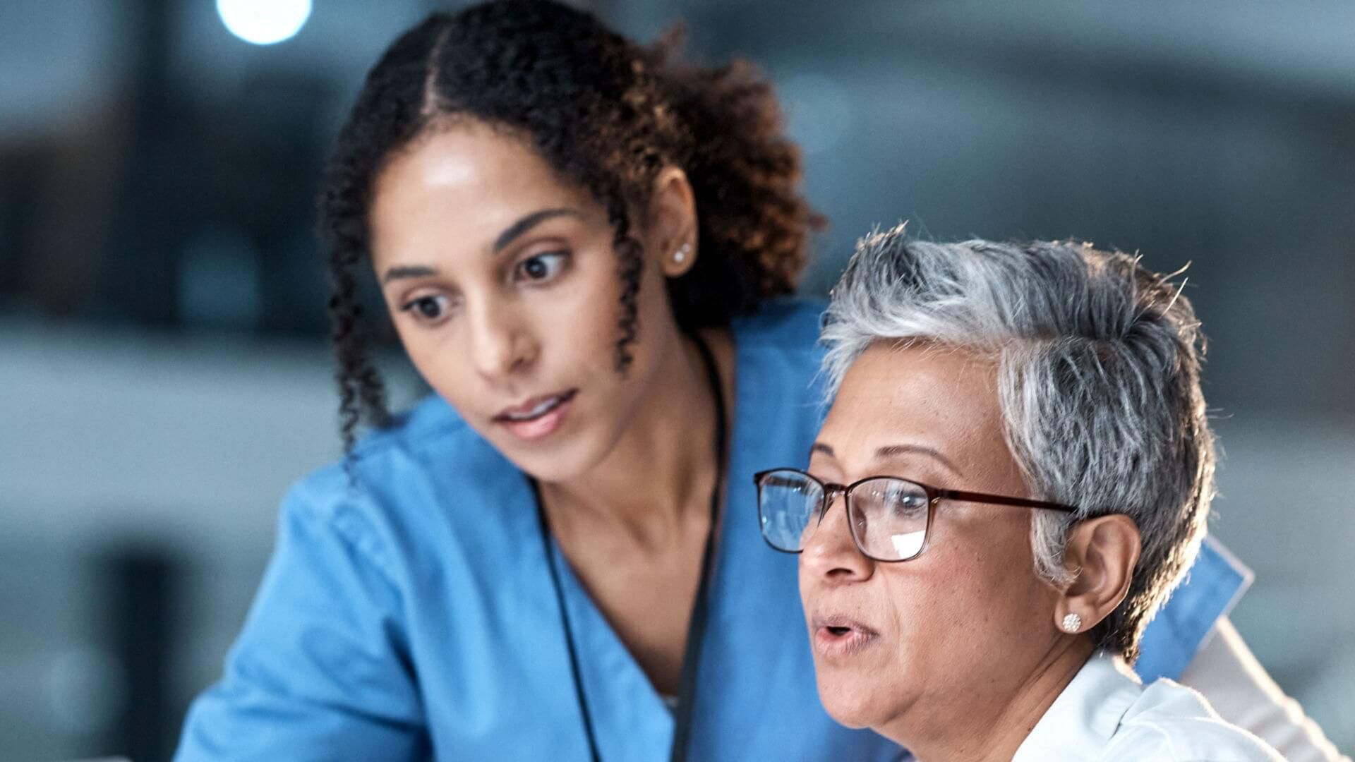 Medical staff reviewing an MRI scan. 