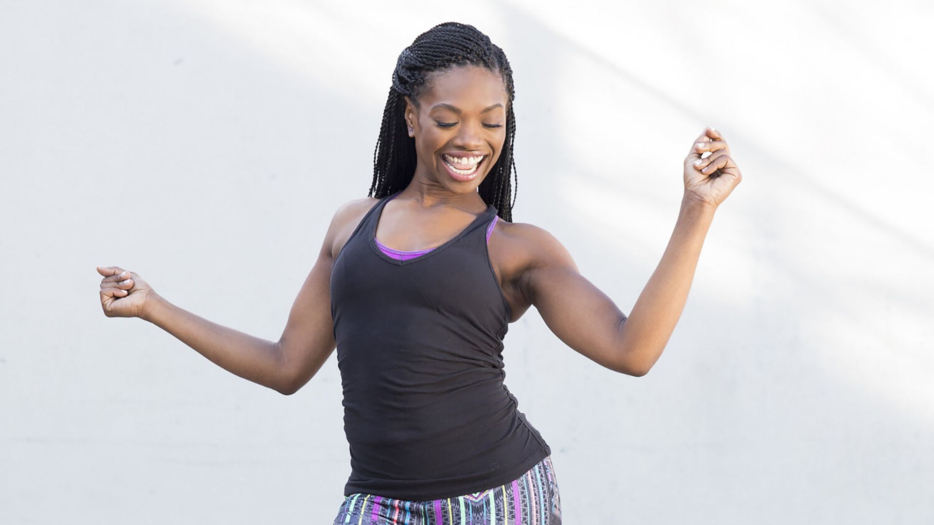 Laci smailing and dancing