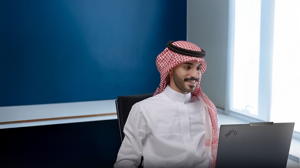 A Meta employee smiling.