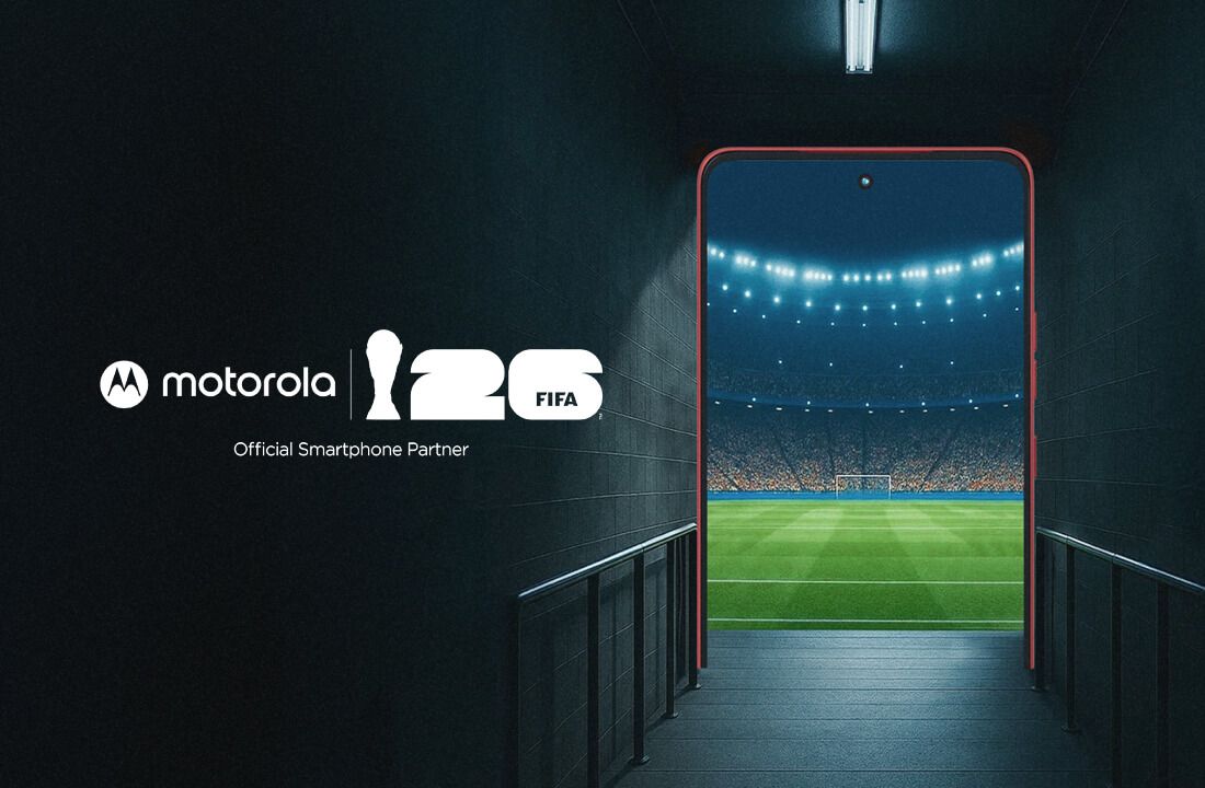 A tunnel leading to a football stadium next to the FIFA and Motorola logos. 