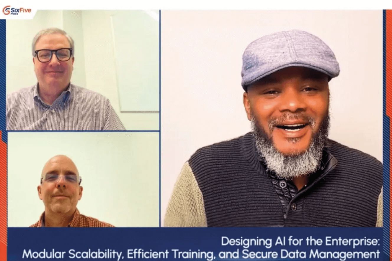 Three people meeting in a web hosted meeting