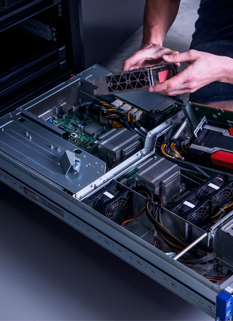 A close-up of hands putting together hardware.