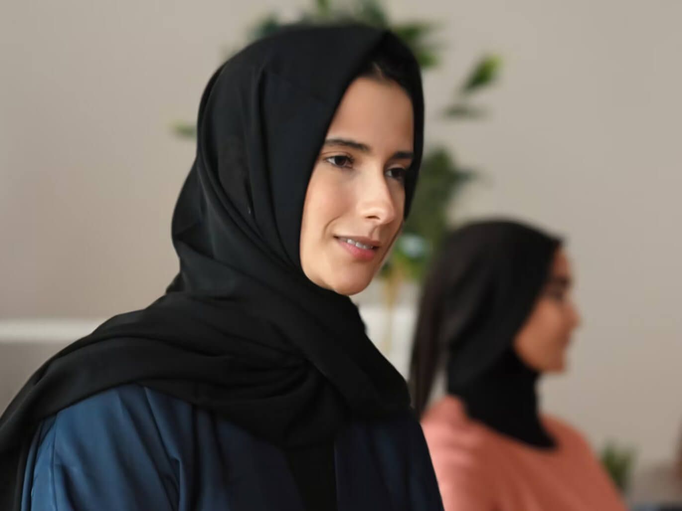 A woman wearing a hijab. 