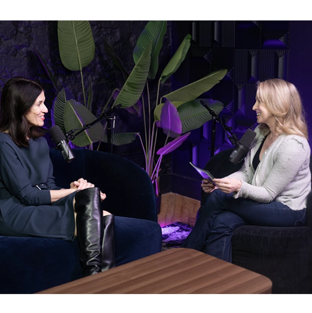heather stern and Michelle Peluso talking during episode interview