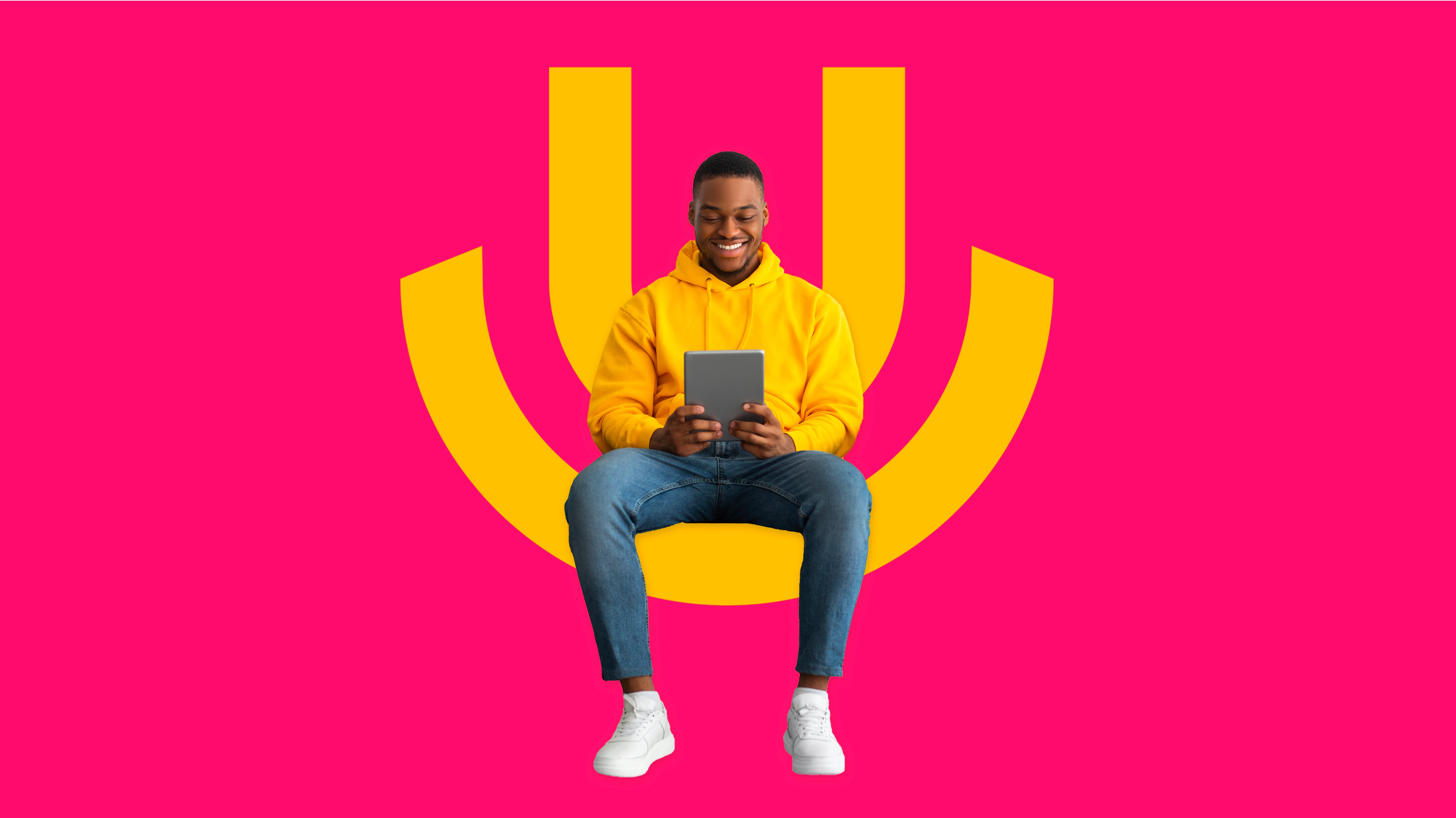 digital image of a man using a tablet sitting on the huru logo