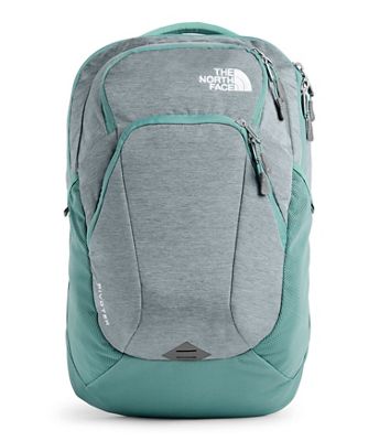 grey and mint green north face backpack