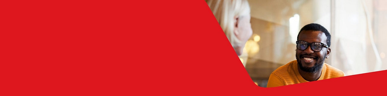 Photo of two brokers discussing our alternative lending solutions