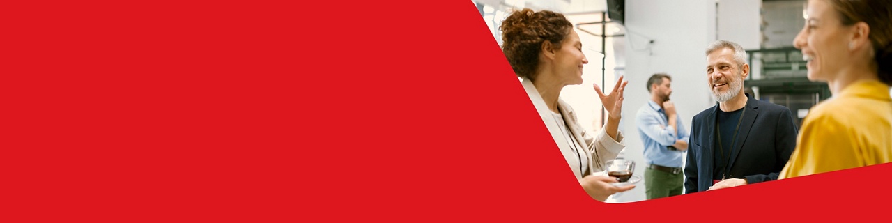 Photo of brokers discussing the Partner Program