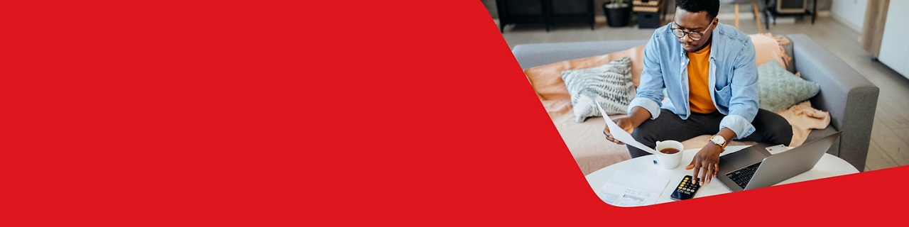 Photo of a man planning for his mortgage with our calculators