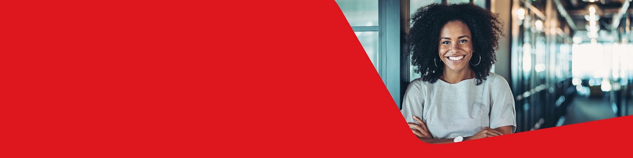 Photo of a woman smiling about opening a business bank account with National Bank