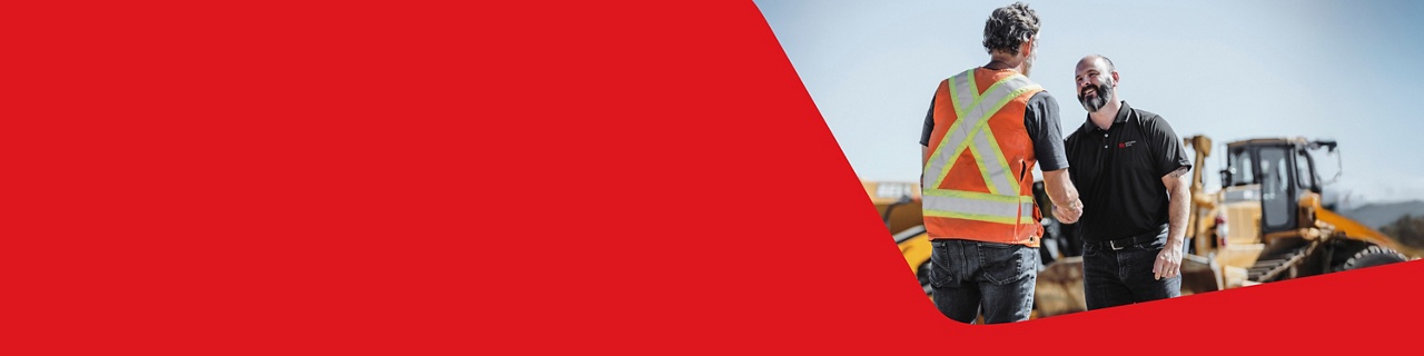 Photo of a business owner and a National Bank expert discussing how choosing National Bank for their equipment financing needs could help their business