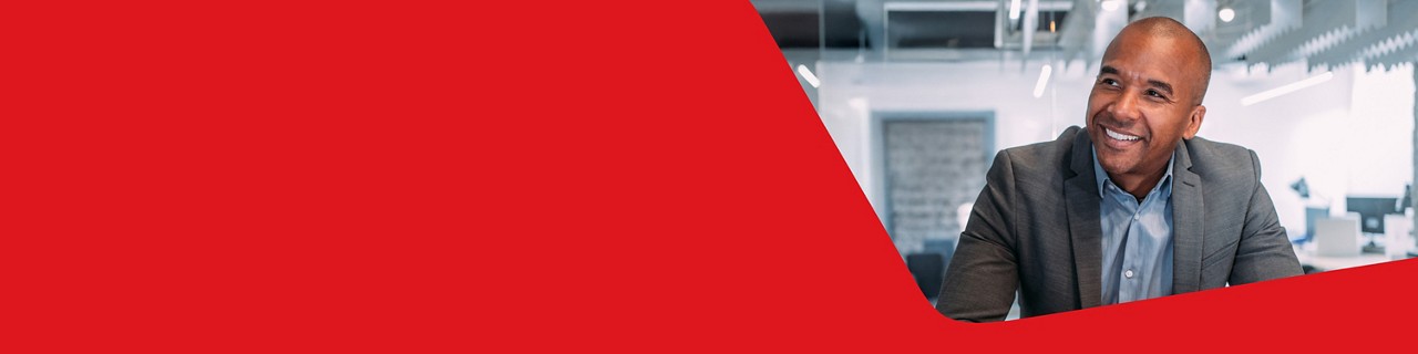 Photo of two entrepreneurs discussing their acquisition financing needs 