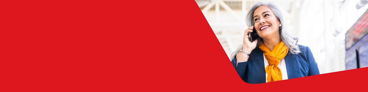 Photo of a woman discussing her mutual funds on the phone