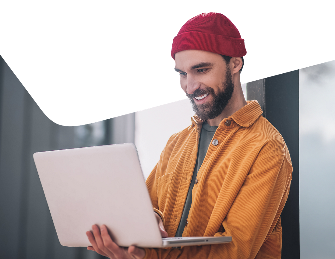 Photo of a man looking at the Directory of Resources on his computer