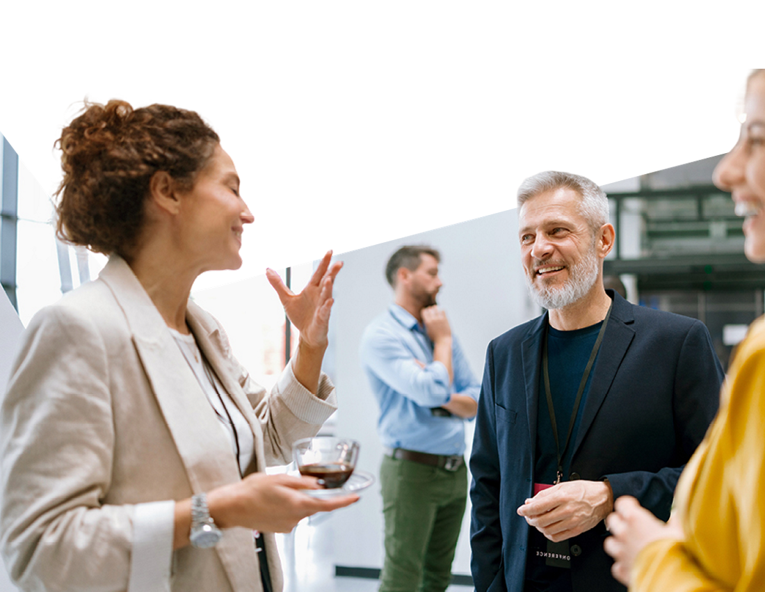 Photo of brokers discussing the Partner Program