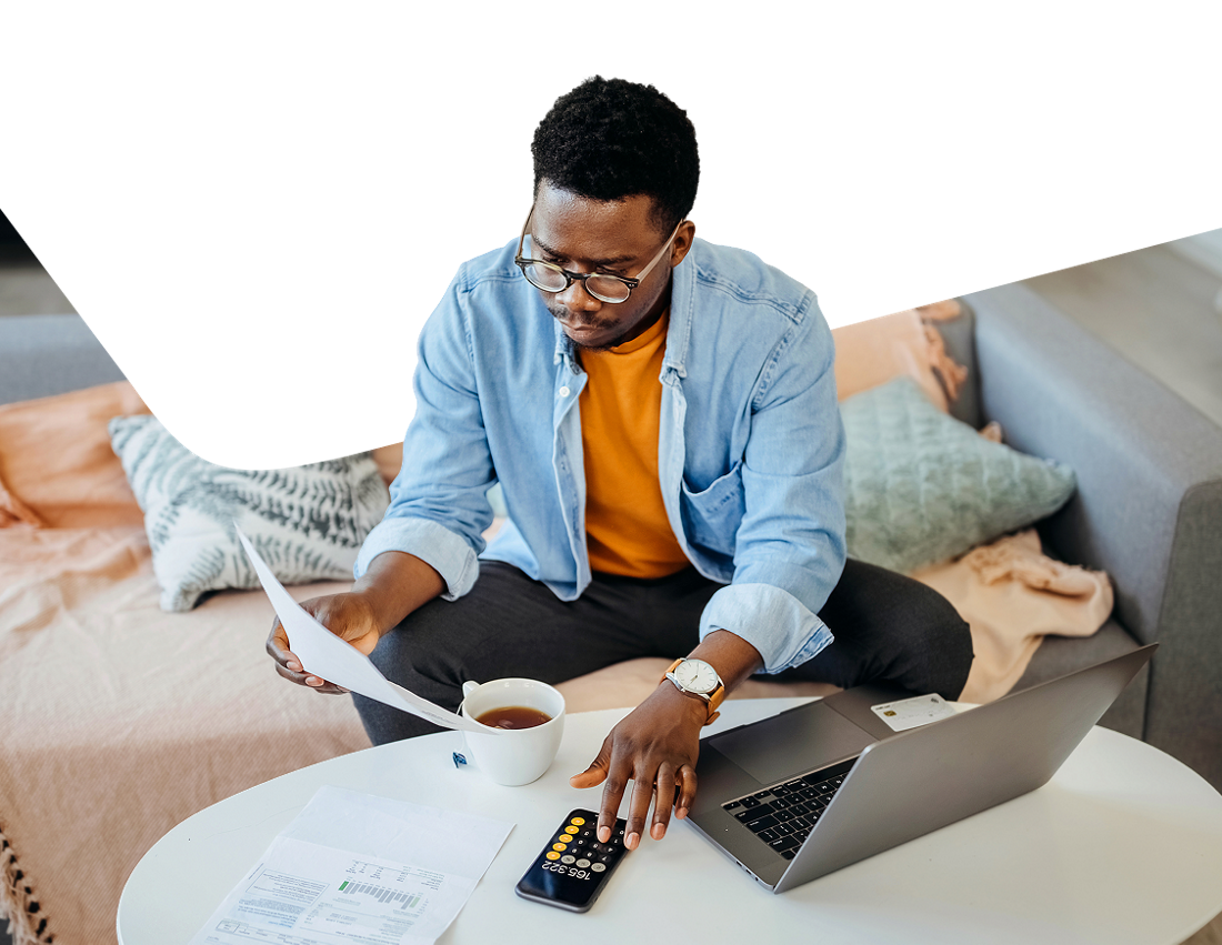 Photo of a man planning for his mortgage with our calculators