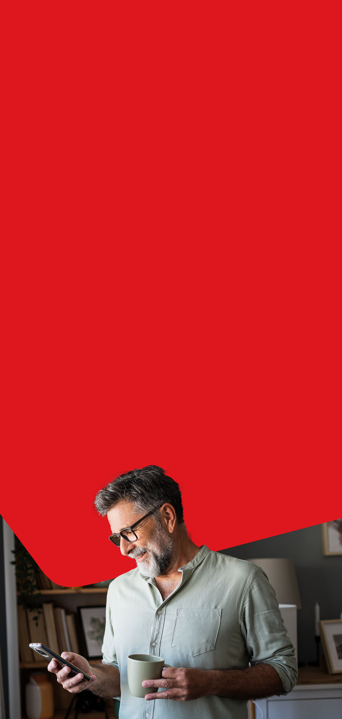 Photo of a man reviewing his GIC options over the phone