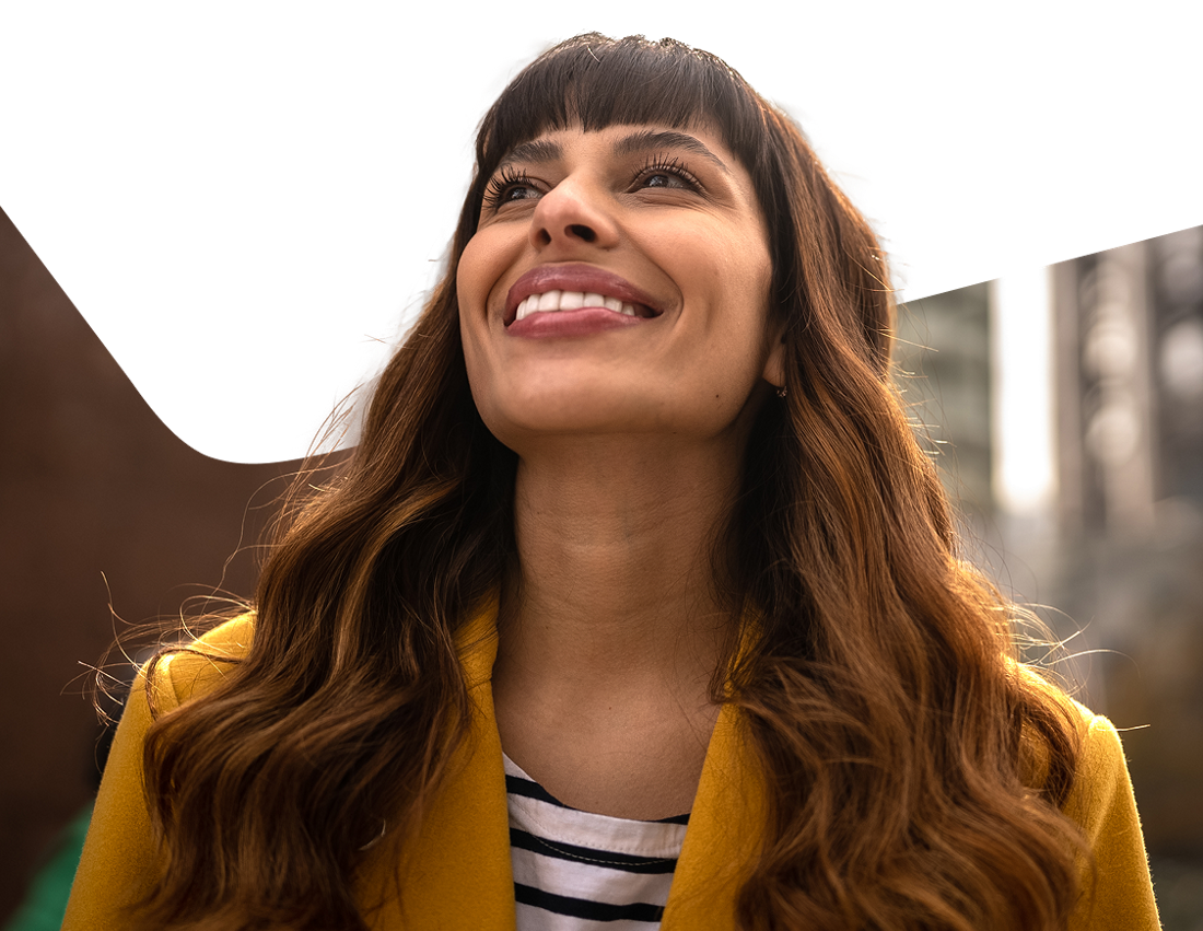 Photo d’une entrepreneure souriante ayant opté pour un compte en devise étrangère de la Banque Nationale 