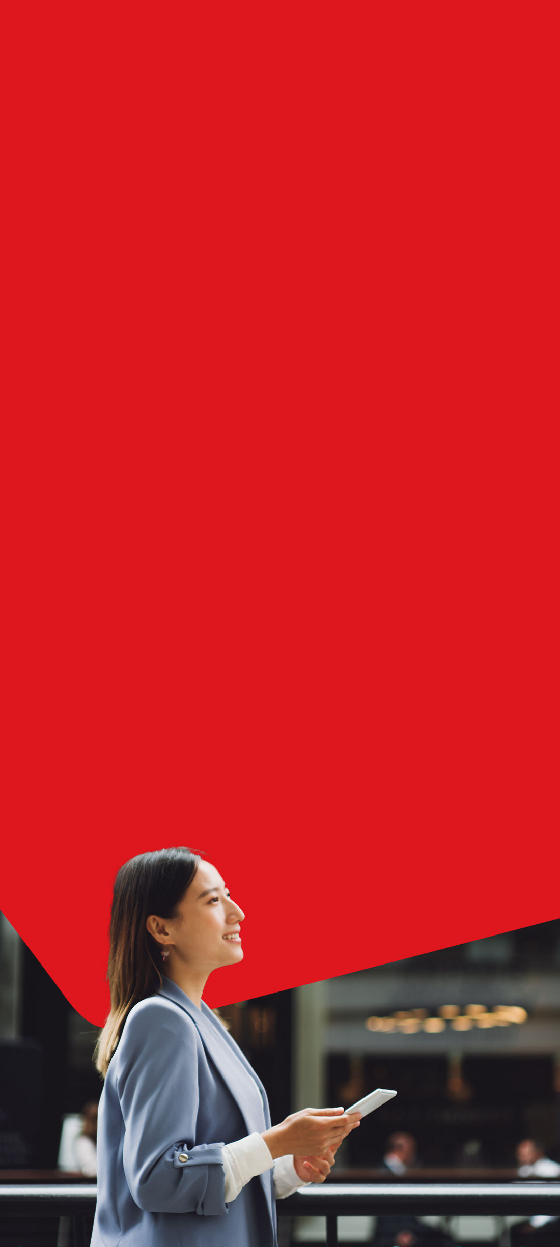 Photo of an entrepreneur managing their cash management and depository service from their cell phone 