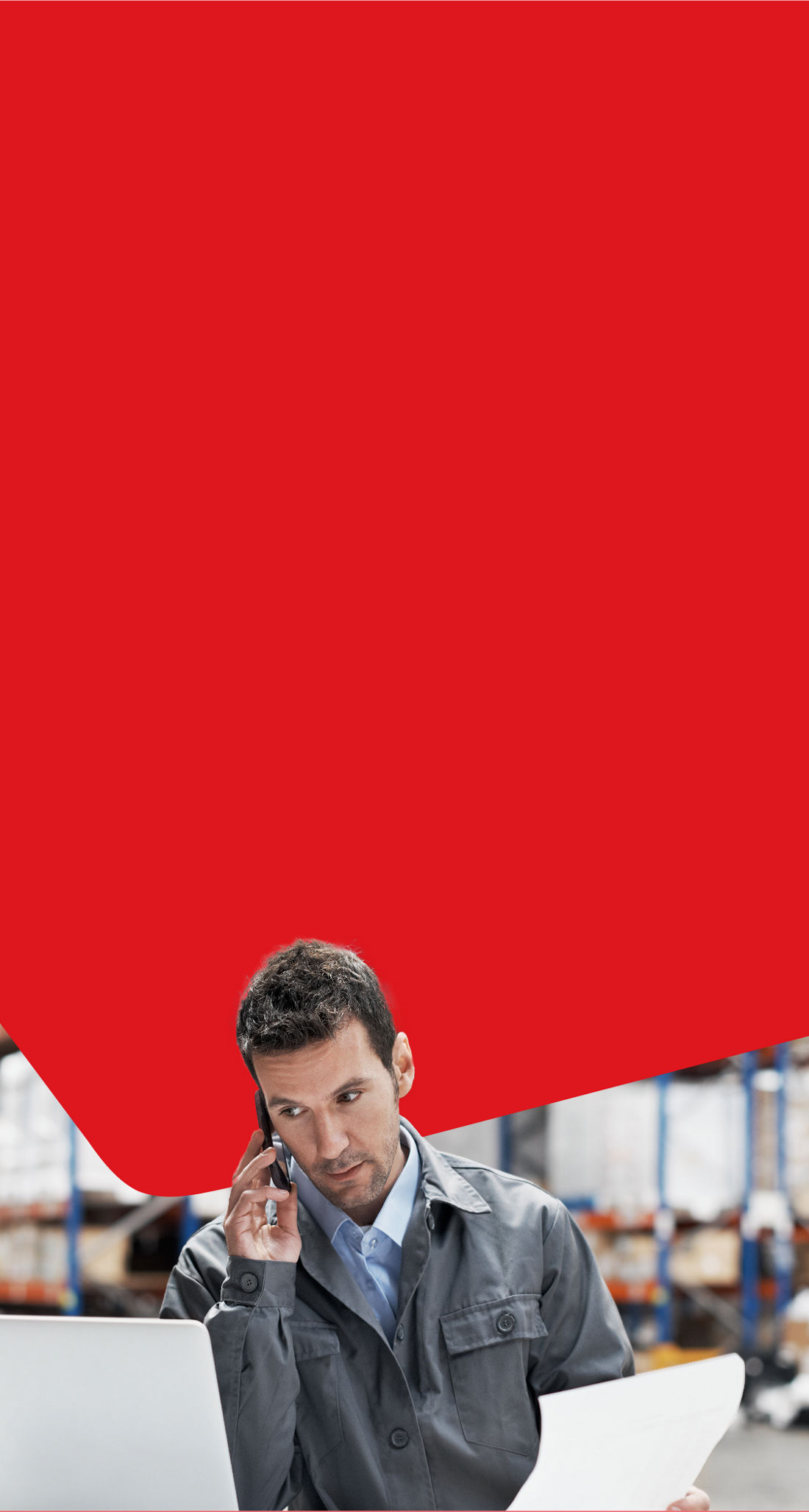 Photo of a man speaking on the phone managing his international payments 