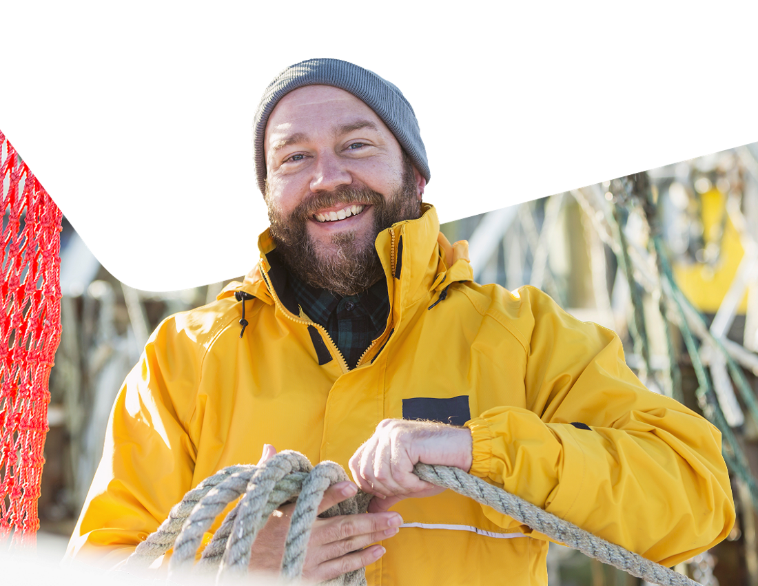 Photo of a fisherman on his boat representing banking solutions for the fishing industry 