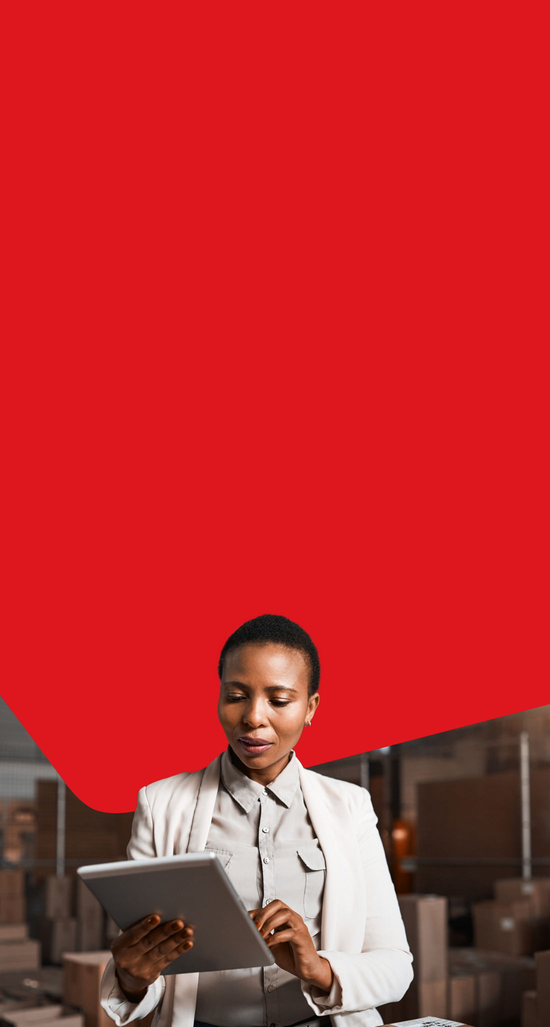 Photo of an entrepreneur handling their everyday banking with National Bank while looking at a tablet