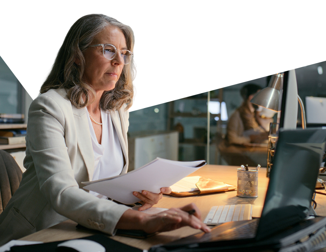 Photo of a professional checking our resources on her computer