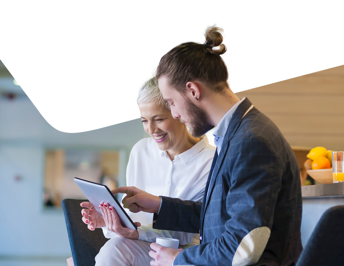 Photo of an advisor with a tablet explaining retirement pension plan to a client 