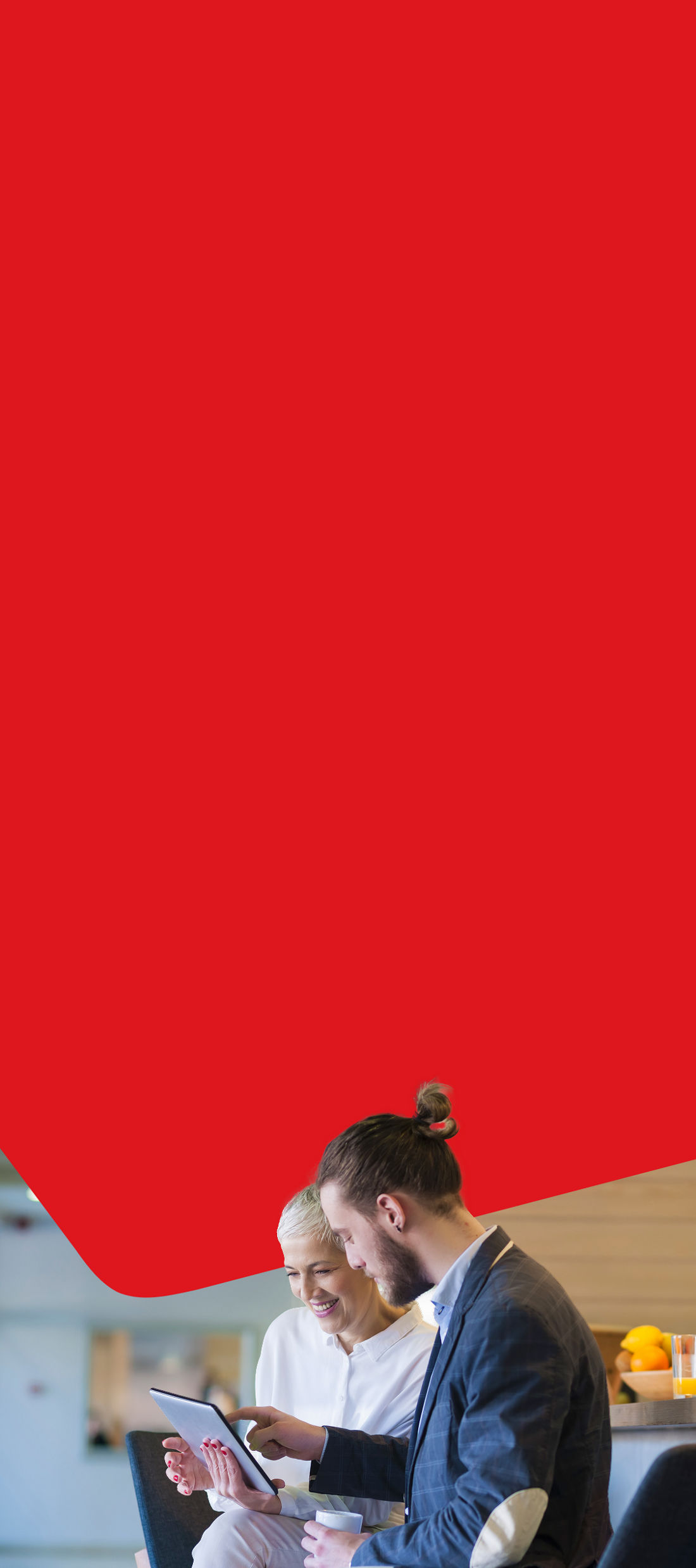 Photo of an advisor with a tablet explaining retirement pension plan to a client 