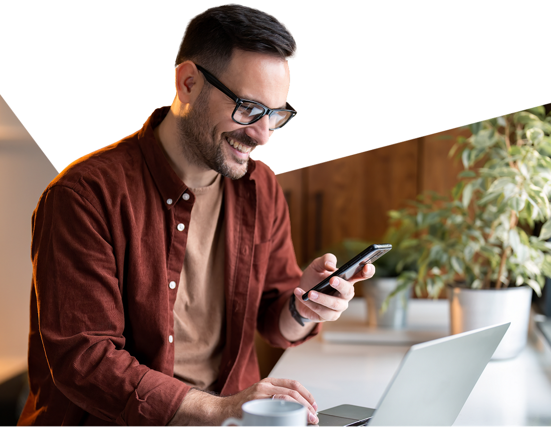 Photo of an entrepreneur on their computer searching for cash flow management solutions 