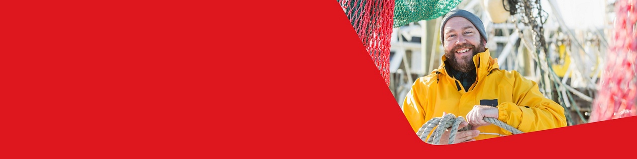 Photo of a fisherman on his boat representing banking solutions for the fishing industry 