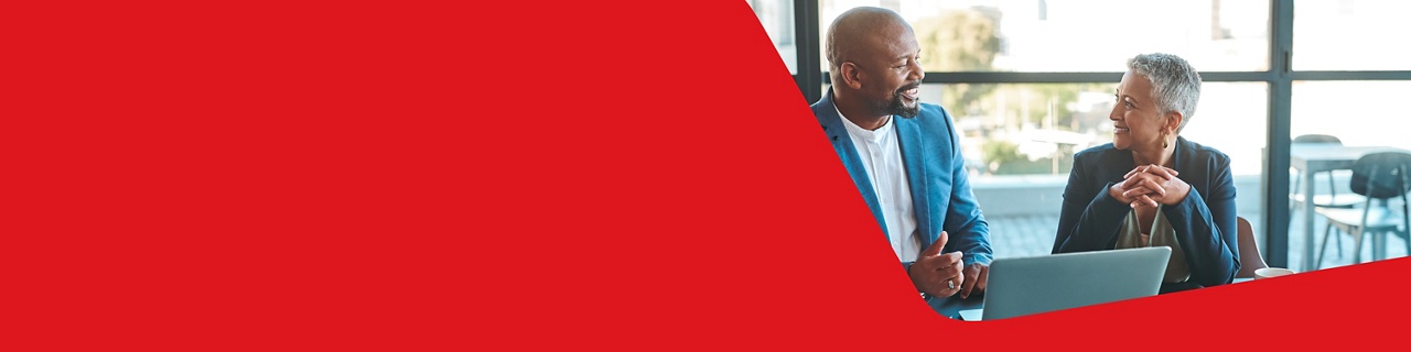 Photo of two managers discussing the different 