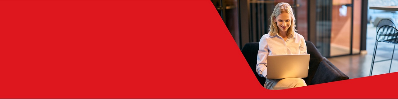 Photo of a woman consulting the security details of her Business Client Card 