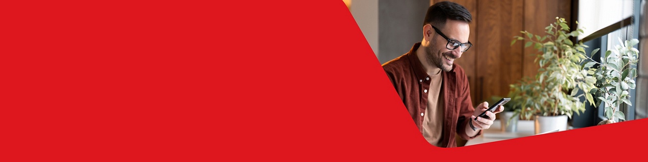 Photo of an entrepreneur on their computer searching for cash flow management solutions 