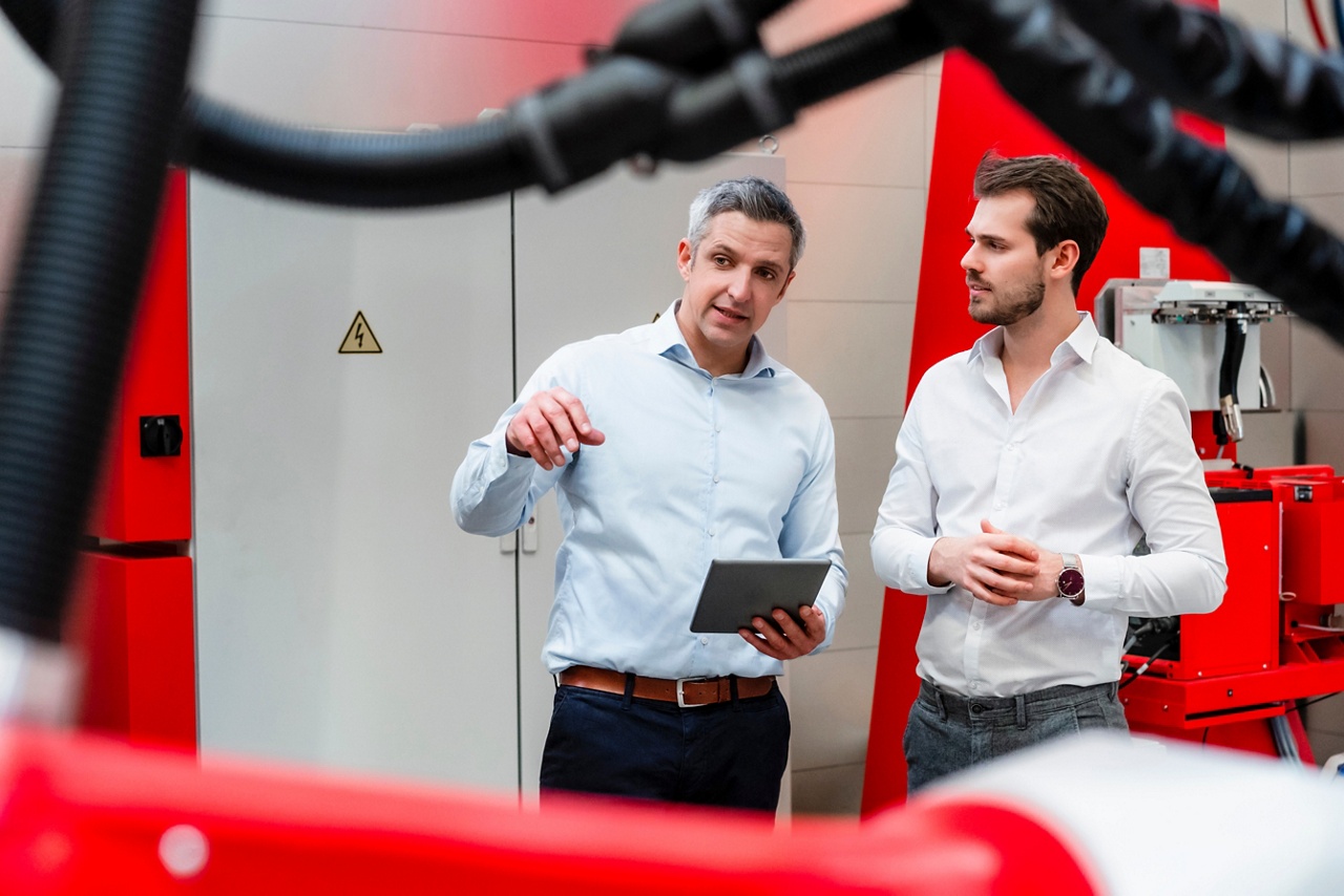 Photo of two entrepreneurs for an article on taking over a business