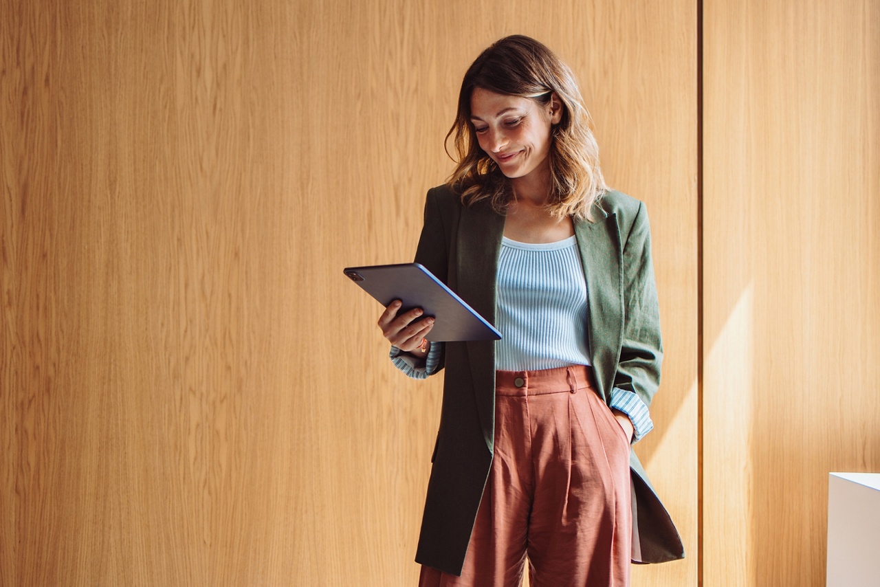 Photo of a business owner learning about how digital transformation can help her grow her business 