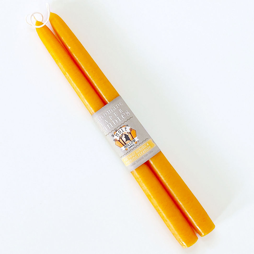 mole hollow yellow orange taper candles