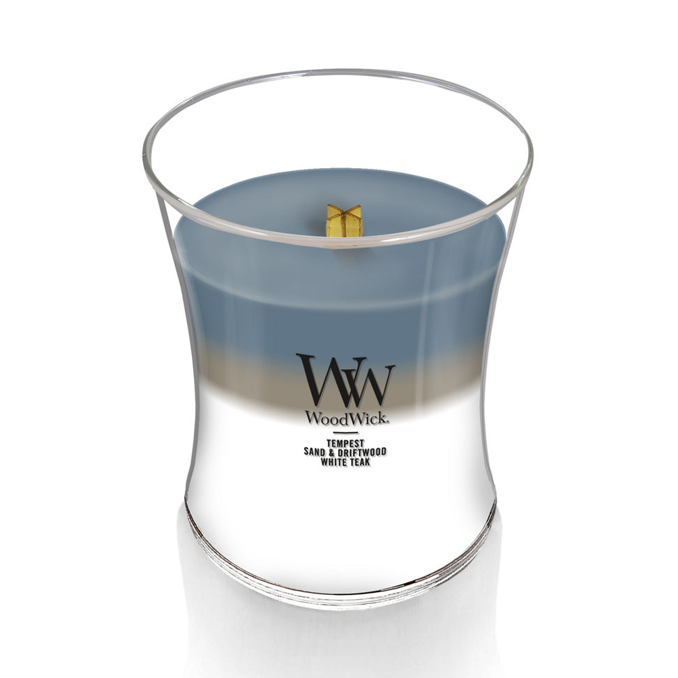 woodwick unchartered waters medium hourglass trilogy candle featuring layered scents of tempest, sand & driftwood, and white teak