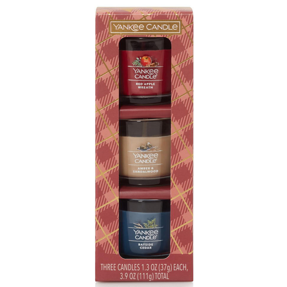 Sweater Weather Yankee Candle Minis Gift Set featuring the fragrances of Red Apple Wreath, Amber & Sandalwood, and Bayside Cedar