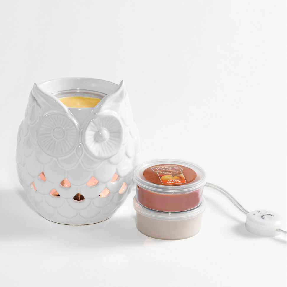 spiced pumpkin warm and cozy meltcups and scenterpiece warmer on table