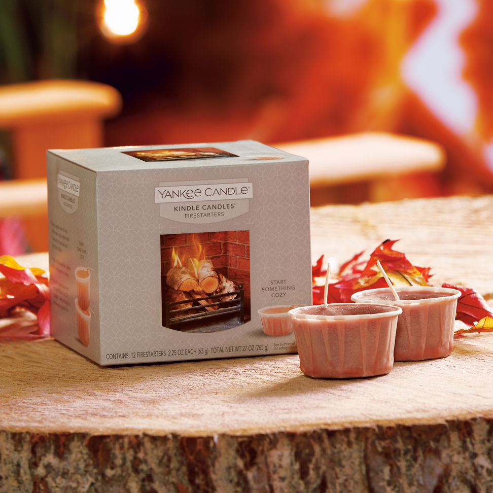 kindle candles firestarters on wooden table