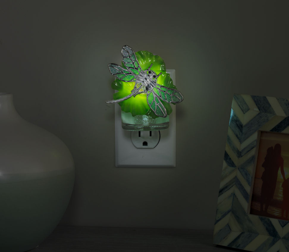 dragonfly on lilypad with light scentplug diffusers in socket